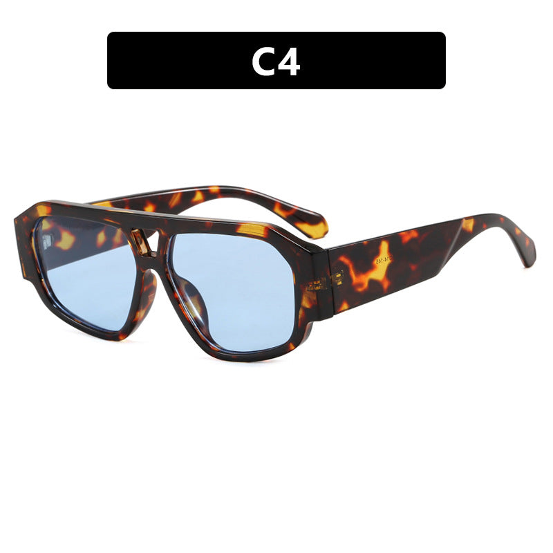 Dame solbrille med iøynefallende oktagon-design og UV-beskyttelse Skanto