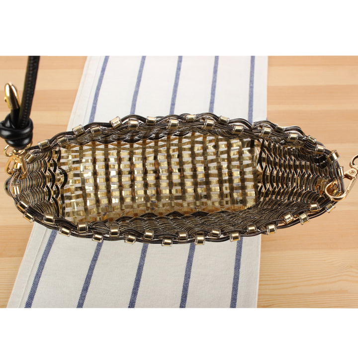 Shoulder bag made of hand-woven synthetic material with fashionable sliding mechanism Skanto