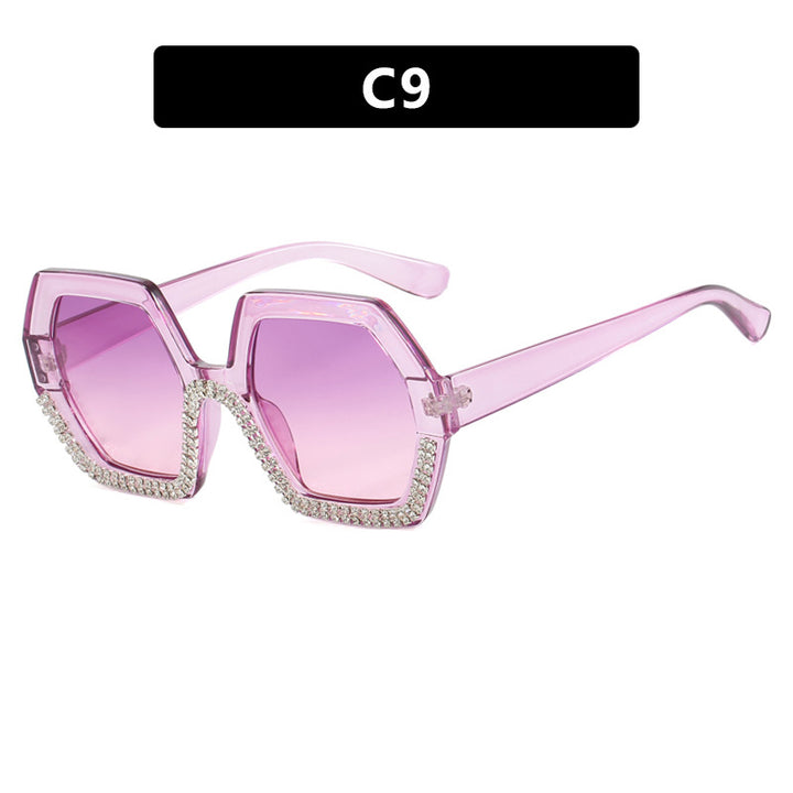 Dame extravagant solbrille med sekstitkantet ramme og strassbelagte aksenter Skanto
