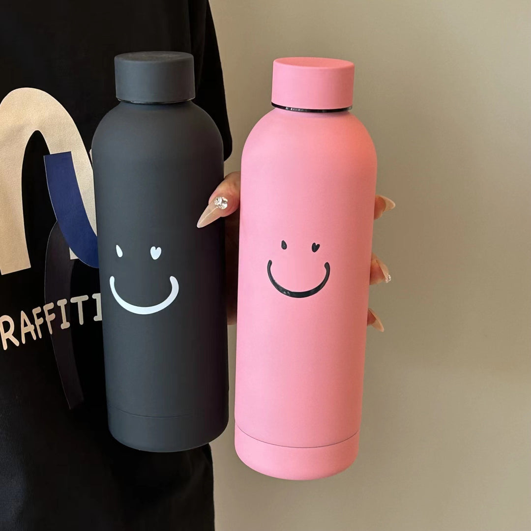 Dame isoleringsflaske med lyst smilendesign Skanto