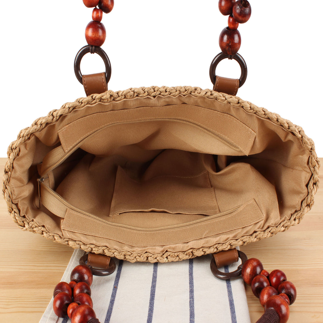 Basket bag with elegant wooden handles and textured surface Skanto
