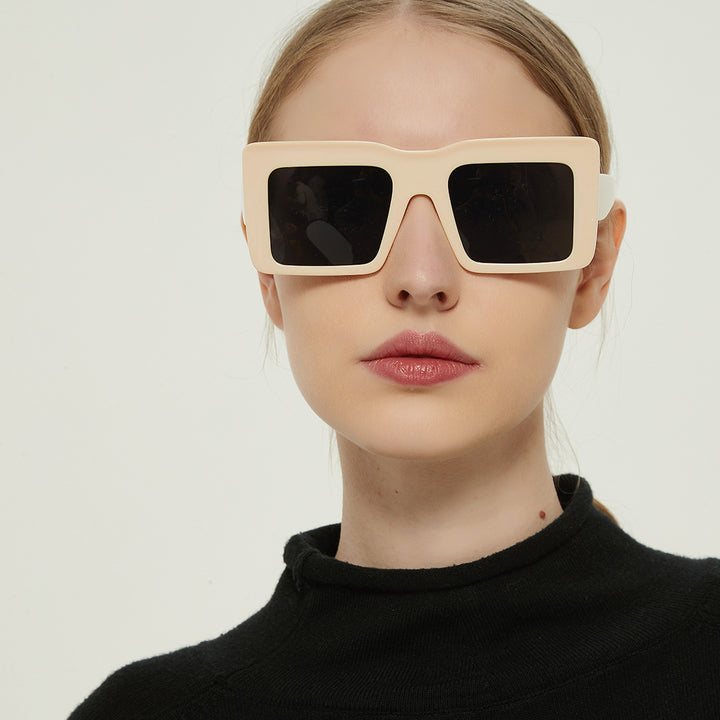 Dame firkantet solbrille med gjennomsiktig ramme og UV-beskyttelse Skanto