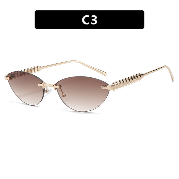 Dame solbrille i moderne, geometrisk design med stilfull metallramme og UV-beskyttelse Skanto