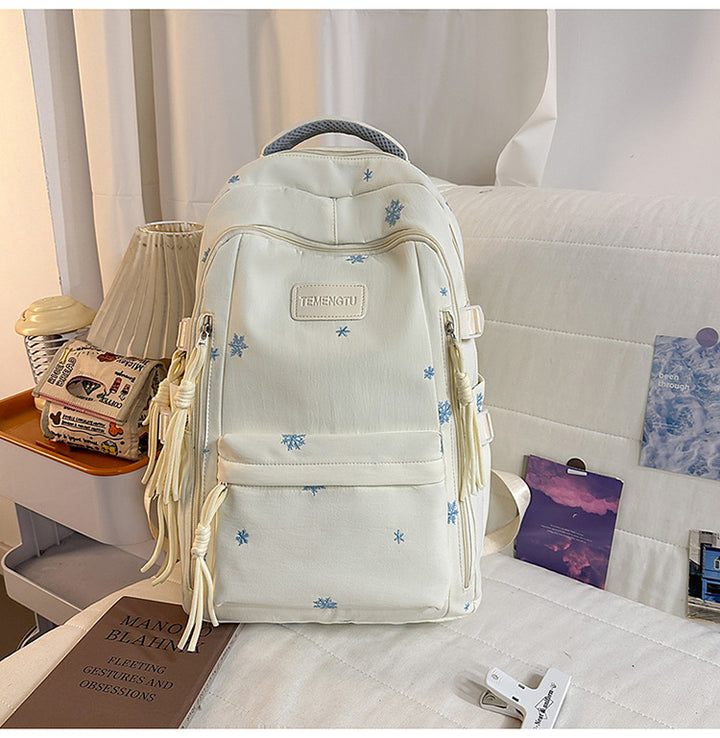Elegant brodert skole ryggsekk