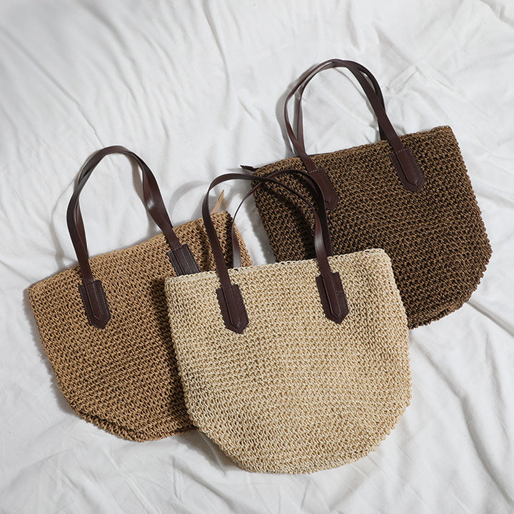 Romslig flettetrillebag med skinnhåndtak Skanto
