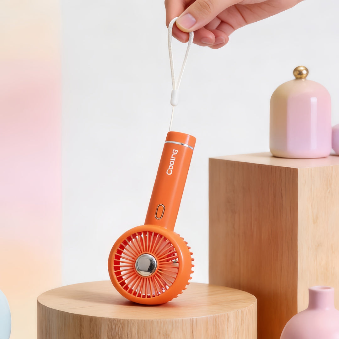 Dame Bærbar Håndvifte med USB-ladefunksjon og innovativt design Skanto