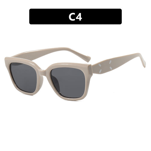 Dame moteriktig kvadratisk solbrille med UV-beskyttelse og elegant plastramme Skanto