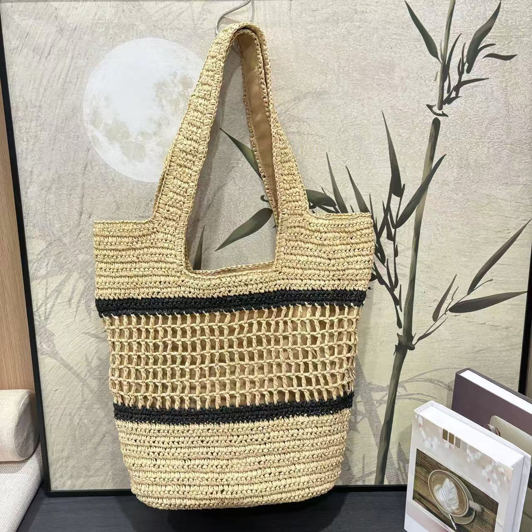 Håndveske laget av flette naturmateriale med elegant struktur Skanto