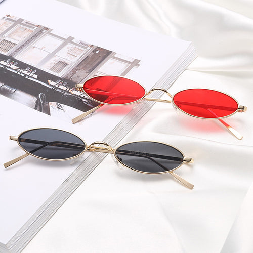 Dame elegant solbrille i oval metallramme Skanto