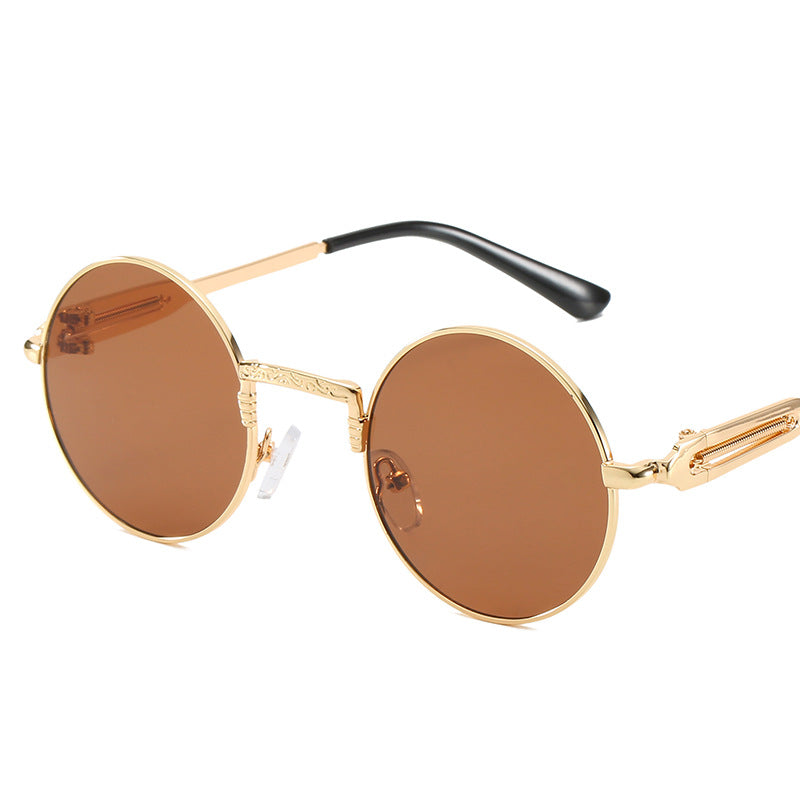 Dame rund modisk solbrille med fint metallramme Skanto