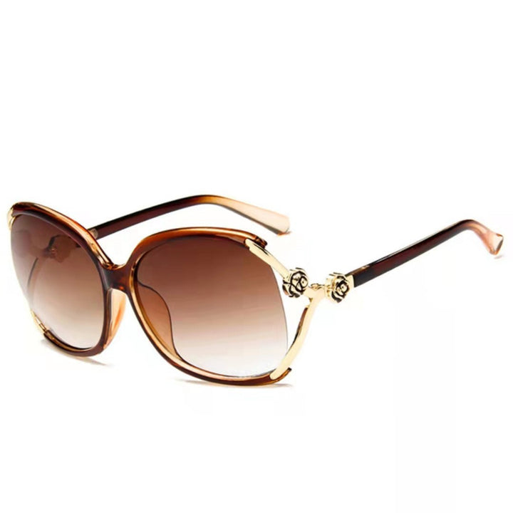Dame elegante oversized solbrille med gyldne aksenter Skanto