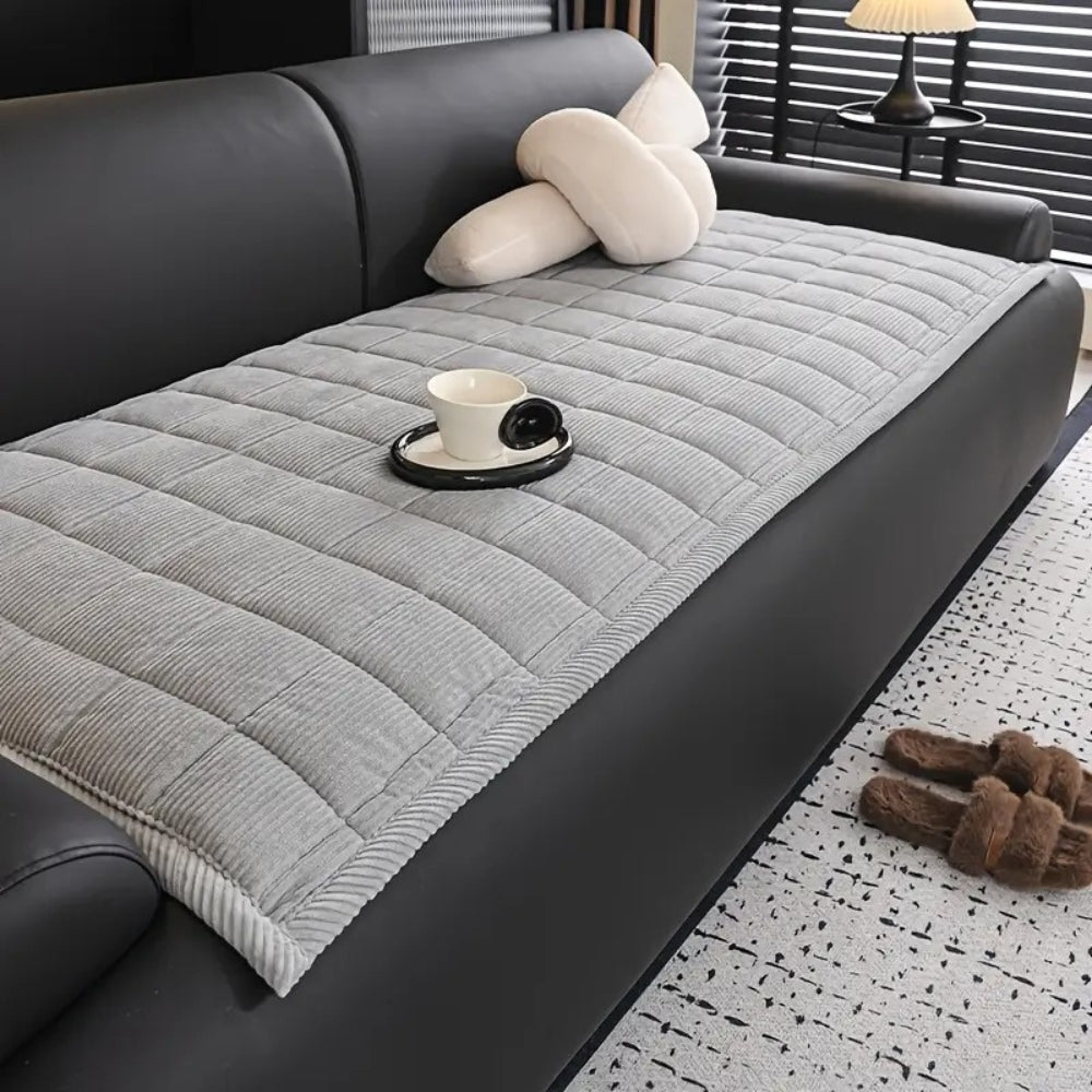 LuxeShield Quiltmatte — Transformér sofaen din til en feilfri oase av komfort og beskyttelse | Skanto