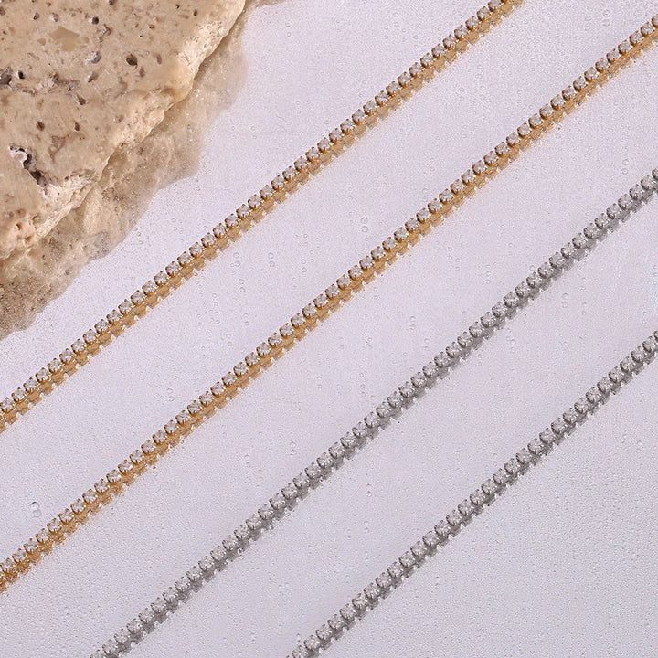 Skanto | 2mm Delikat Tenniskjede Armbånd og Halskjede