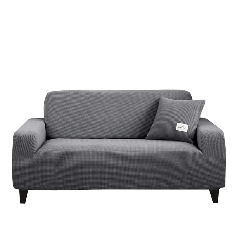 Skanto | CushionWrap - Elastisk, halkefri sofatrekk