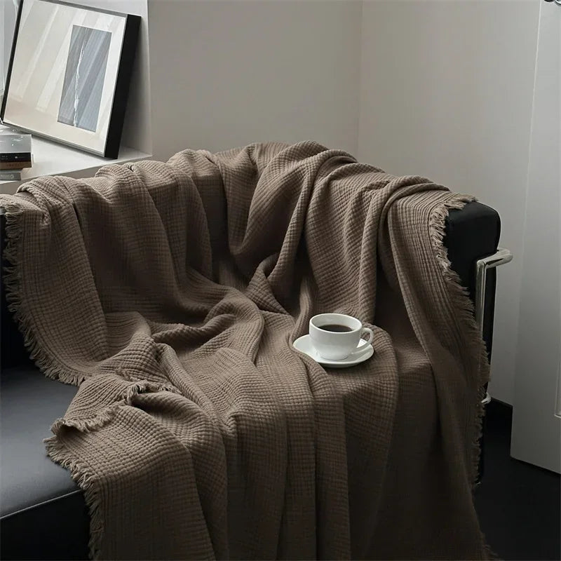 Skanto | Ensfarget bomull sofa teppe