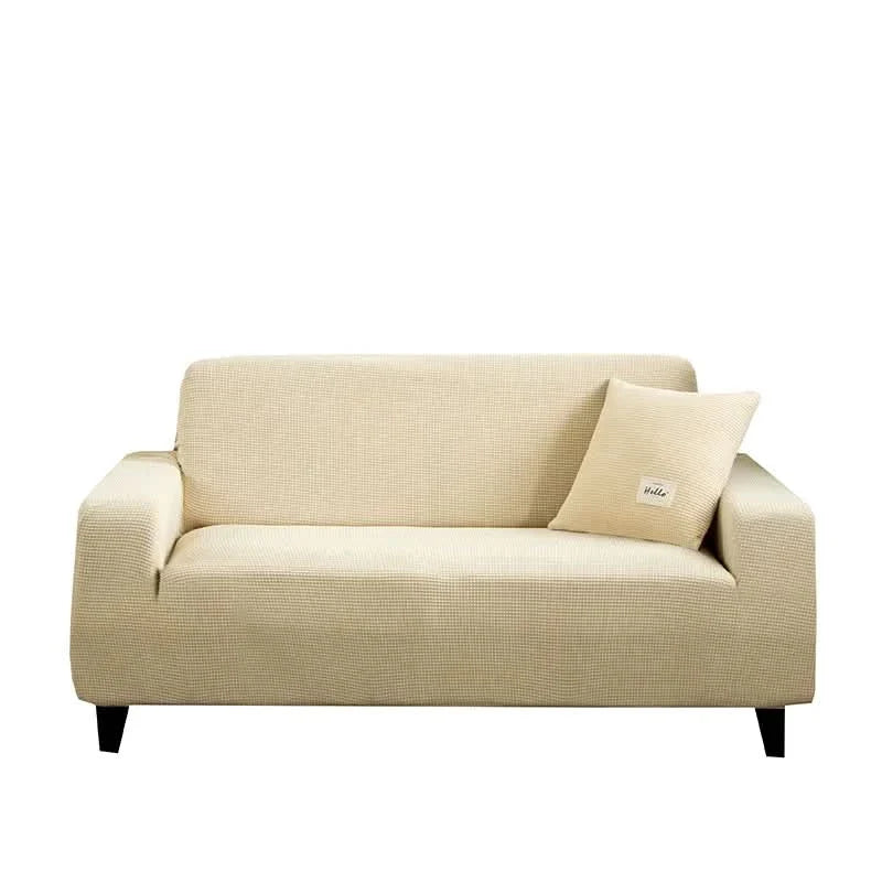 Skanto | CushionWrap - Elastisk, halkefri sofatrekk