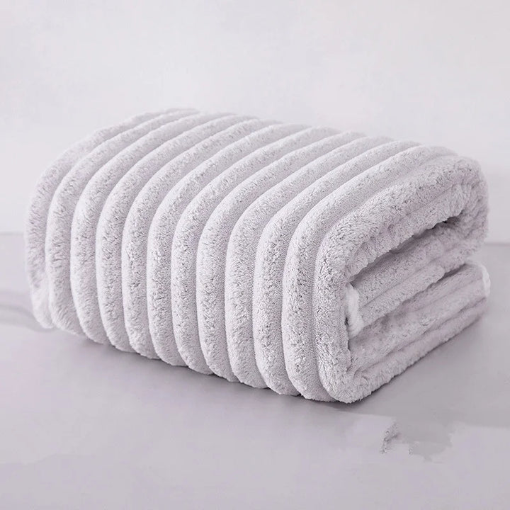 Skanto | Rask absorbering korall plysj håndkle