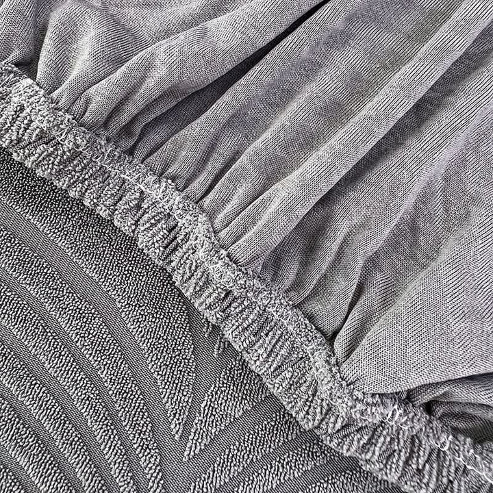 Skanto | PlushSecure - Elegant Jacquard Sofa Cover for Non-Slip Comfort