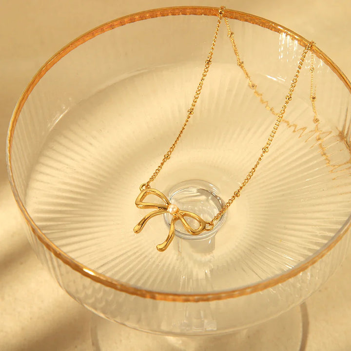 Skanto | 18k Feminine Bow Herringbone & Dainty Pearl Necklace