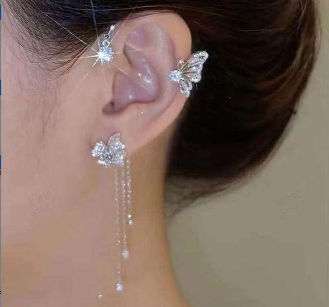 Skanto | Elegant uttalelsesøredobber med sommerfugldesign og glitrende zirconia