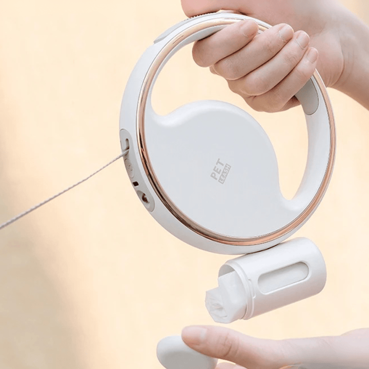 Skanto | Automatisk hundesnor med LED-lampe og avfallssekkholder for stressfrie turer