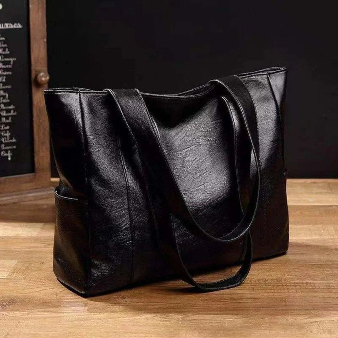Elegante Schultertasche aus Leder im Retro-Stil mit glatter Oberfläche
