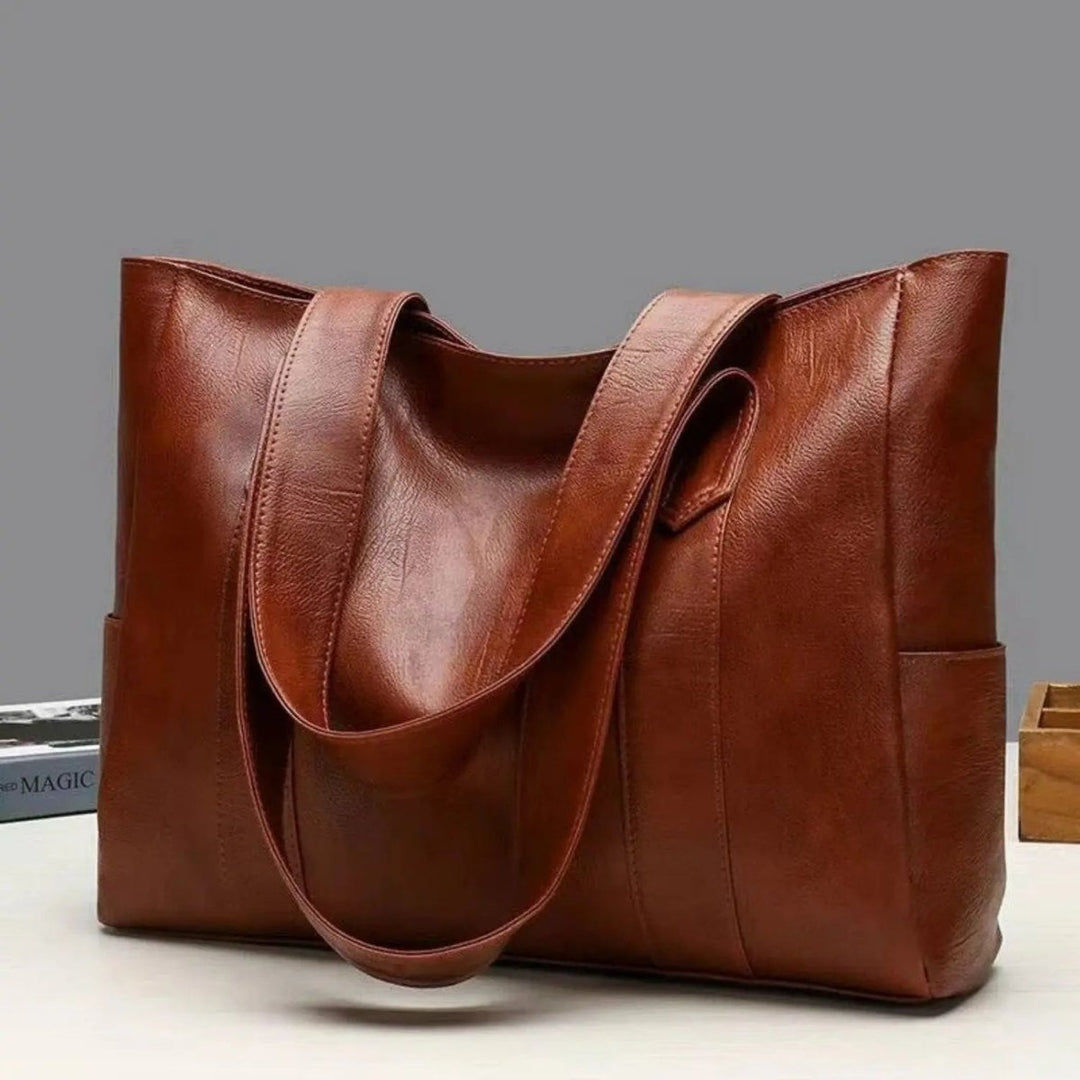 Elegante Schultertasche aus Leder im Retro-Stil mit glatter Oberfläche