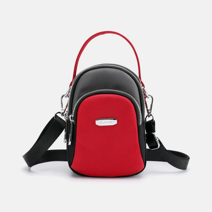 Vanntett liten skulderveske laget av nylon | Skanto