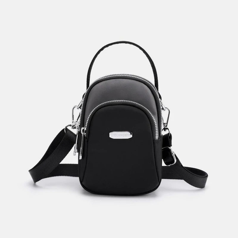 Vanntett liten skulderveske laget av nylon | Skanto