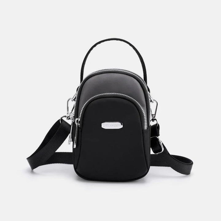 Vanntett liten skulderveske laget av nylon | Skanto