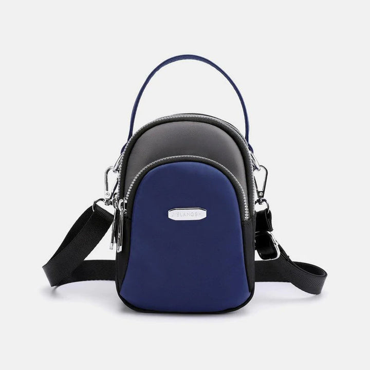 Vanntett liten skulderveske laget av nylon | Skanto