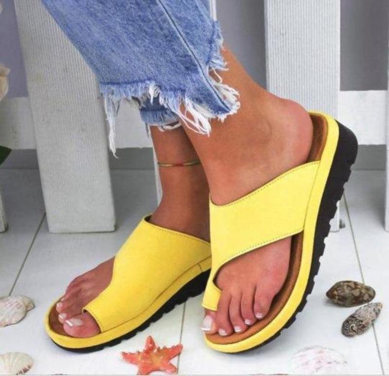 Ortopediske damesandaler, korrigering av hallux valgus