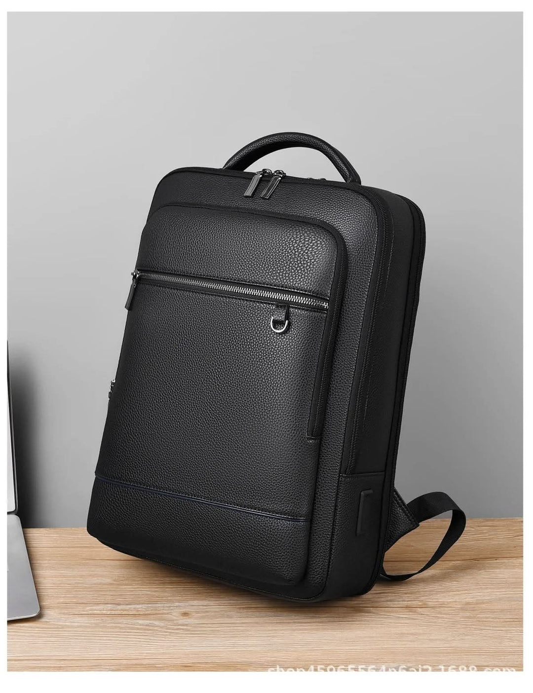 Skanto | Elegant lær ryggsekk for menn/kvinner med USB-port for laptop og hverdagsbruk, 15,6 tommer, svart