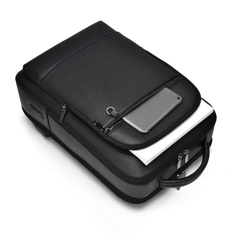 Skanto | Elegant lær ryggsekk for menn/kvinner med USB-port for laptop og hverdagsbruk, 15,6 tommer, svart