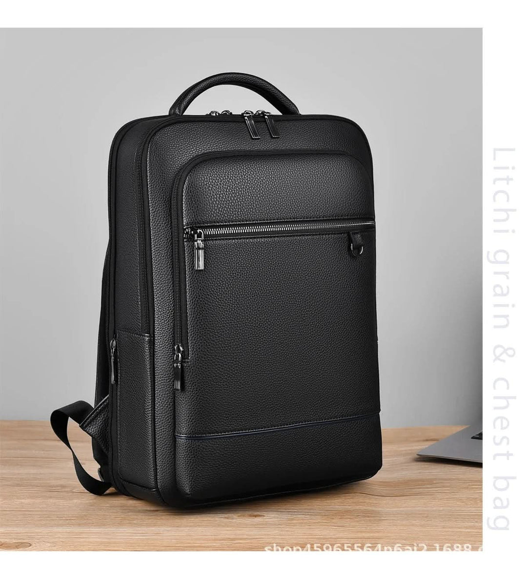Skanto | Elegant lær ryggsekk for menn/kvinner med USB-port for laptop og hverdagsbruk, 15,6 tommer, svart