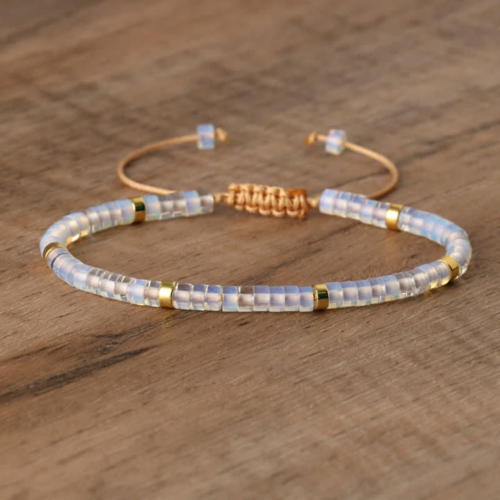 Skanto | Flettet armbånd med 2,4 mm naturstein ruller – Seraphina