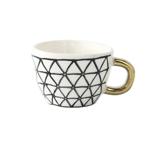 Kopp med abstrakt geometrisk monster og måkehank