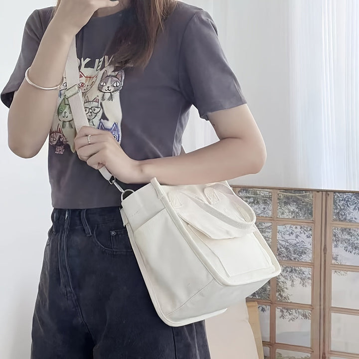 UrbanEase Canvas Slingbag – Hvit skulderveske med magnetlukking og justerbar stropp | Skanto