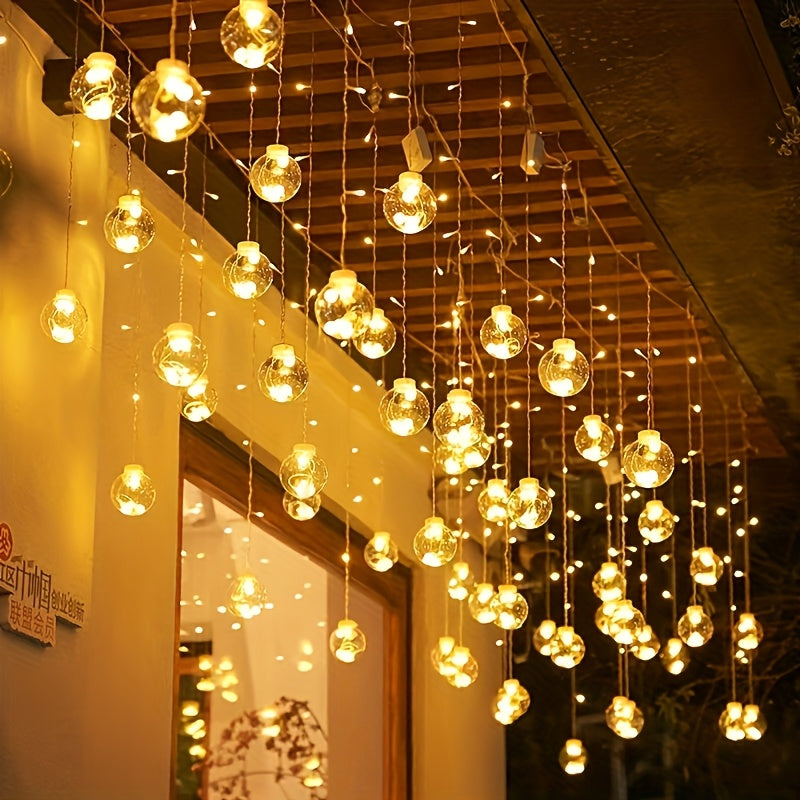Skanto | Eventyrlys med hengende globusornamenter