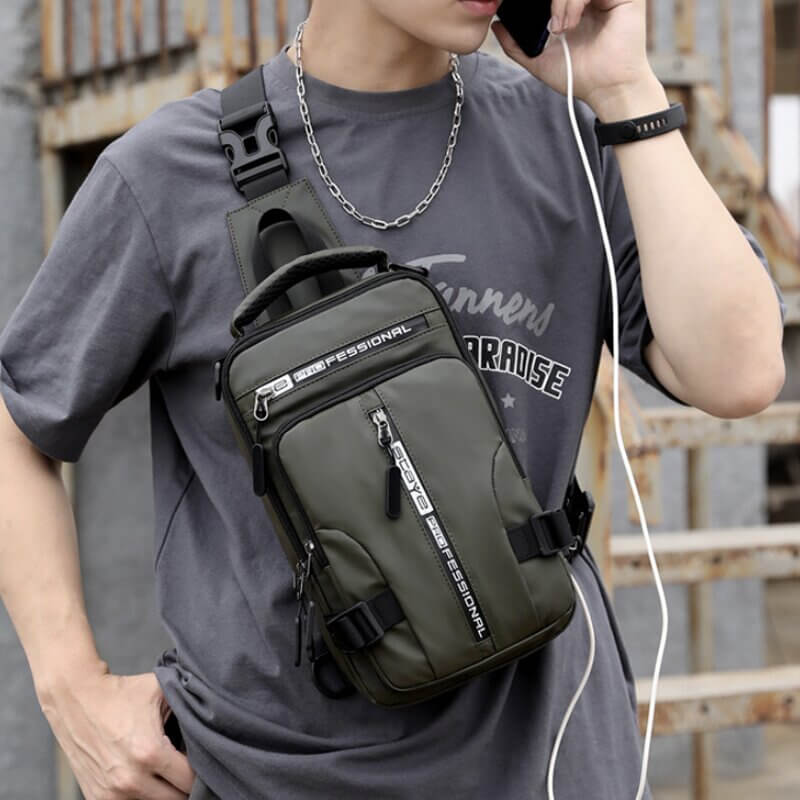 Skanto | Vanntett Oxford Crossbody Bag, Tyverisikkert Sling Bag, USB Lading & Flerlommes Design