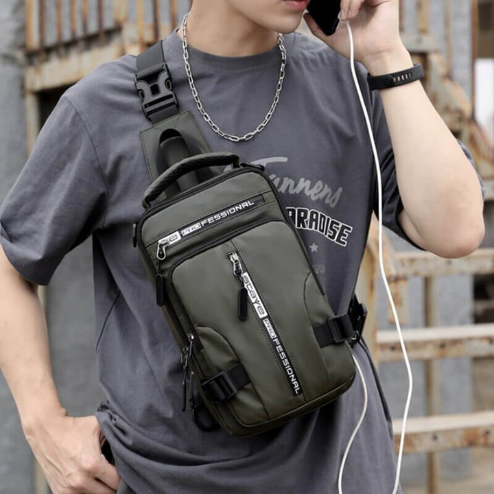 Skanto | Vanntett Oxford Crossbody Bag, Tyverisikkert Sling Bag, USB Lading & Flerlommes Design