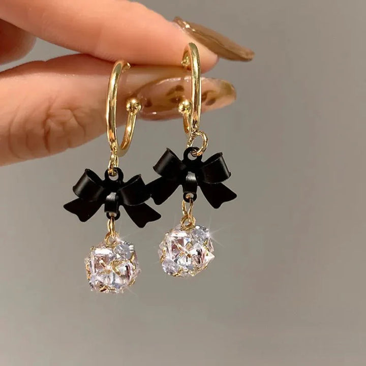 Skanto | Delikat Sløyfe Diamant Drapé Øredobber