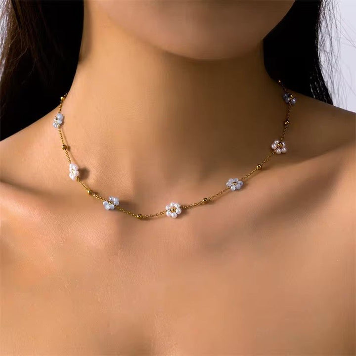 Skanto | Delikat Daisy Halskjede & Armbånd
