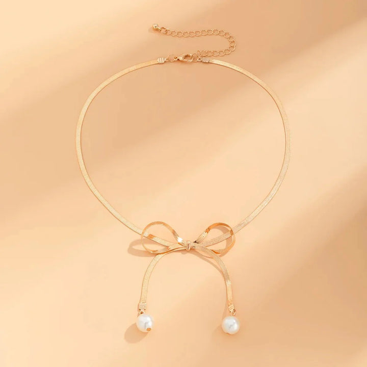 Skanto | Dainty Herringbone Pearl Bow Necklace