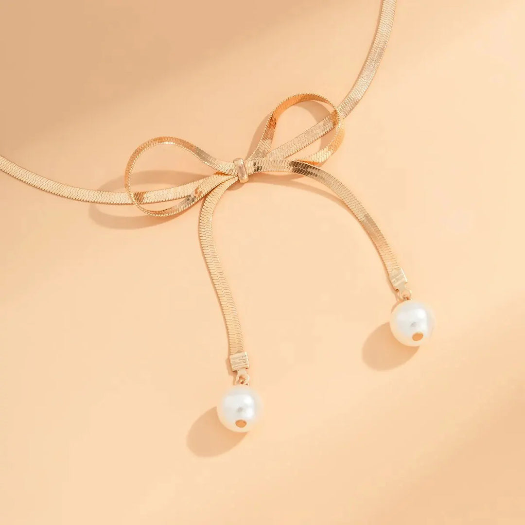 Skanto | Dainty Herringbone Pearl Bow Necklace