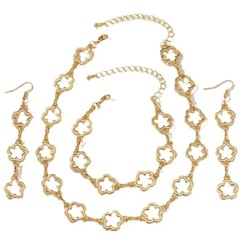 Skanto | Delikat Åpen Kløver Choker Halskjede, Armbånd, Øredobber Sett