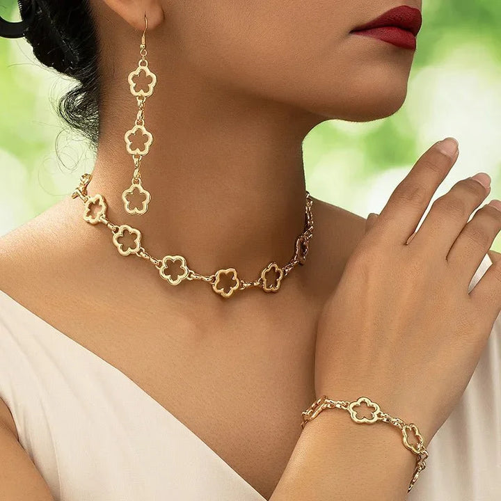 Skanto | Delikat Åpen Kløver Choker Halskjede, Armbånd, Øredobber Sett