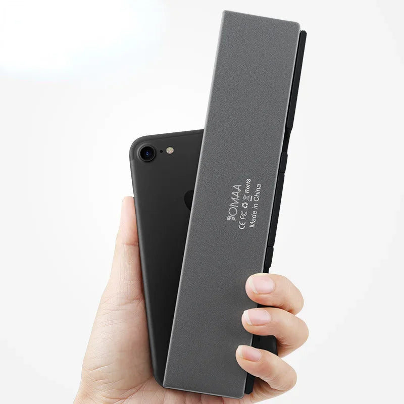 Skanto | Sammenleggbar Bluetooth-tastatur med magnetisk stativ for nettbrett