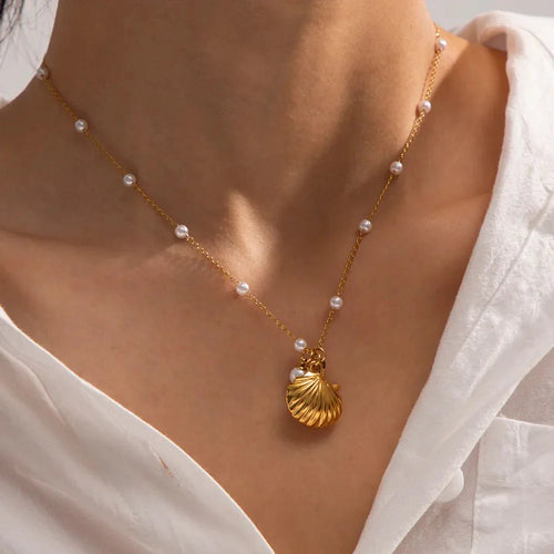 Skanto | Elegante Delikate Spaced Perle Musling Smykke