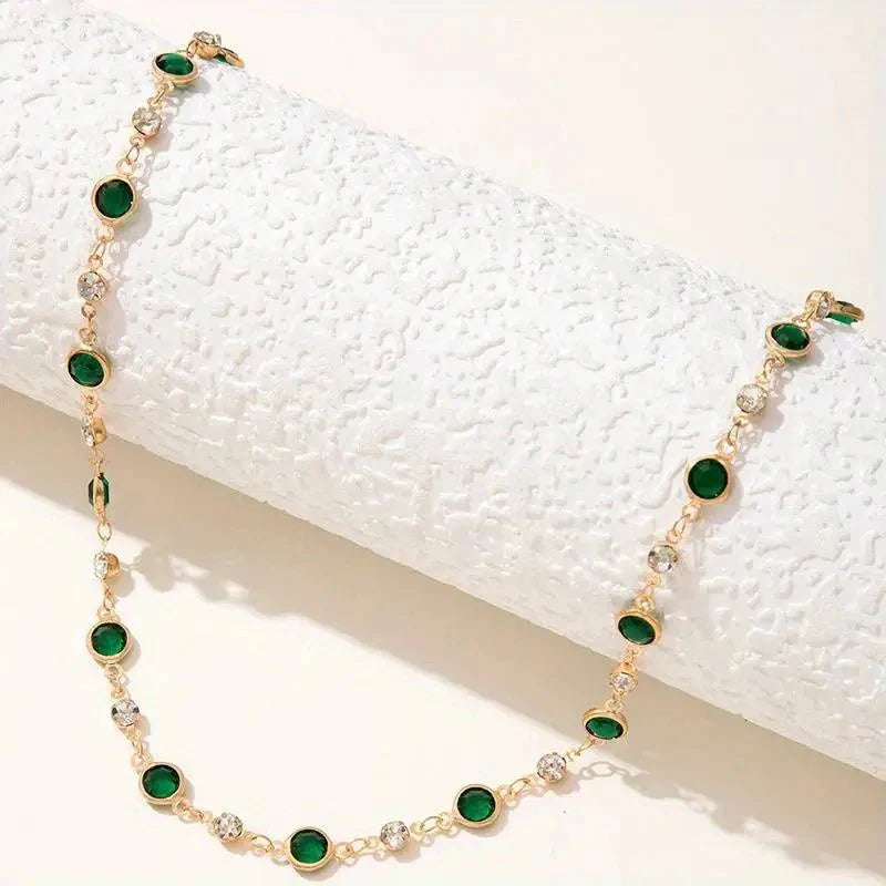 Skanto | Smaragd- og diamant-spaced choker-halskjede